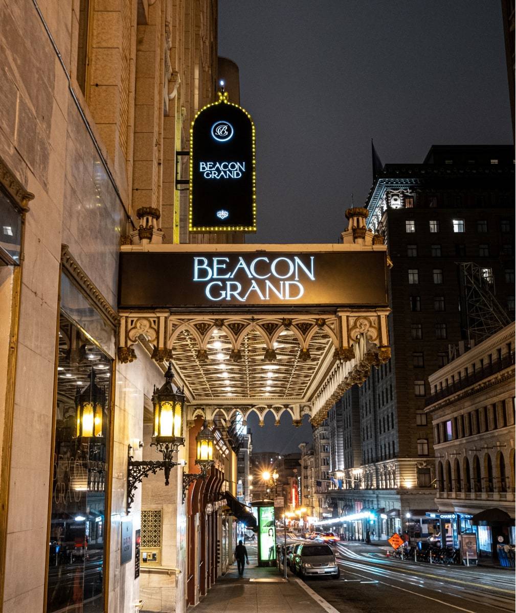 Exterior of the Beacon Grand in San Francisco featuring signage