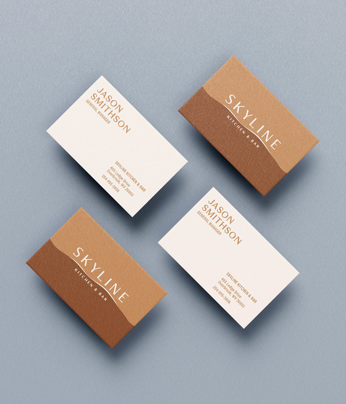 Two-toned Skyline Kitchen and Bar business cards.