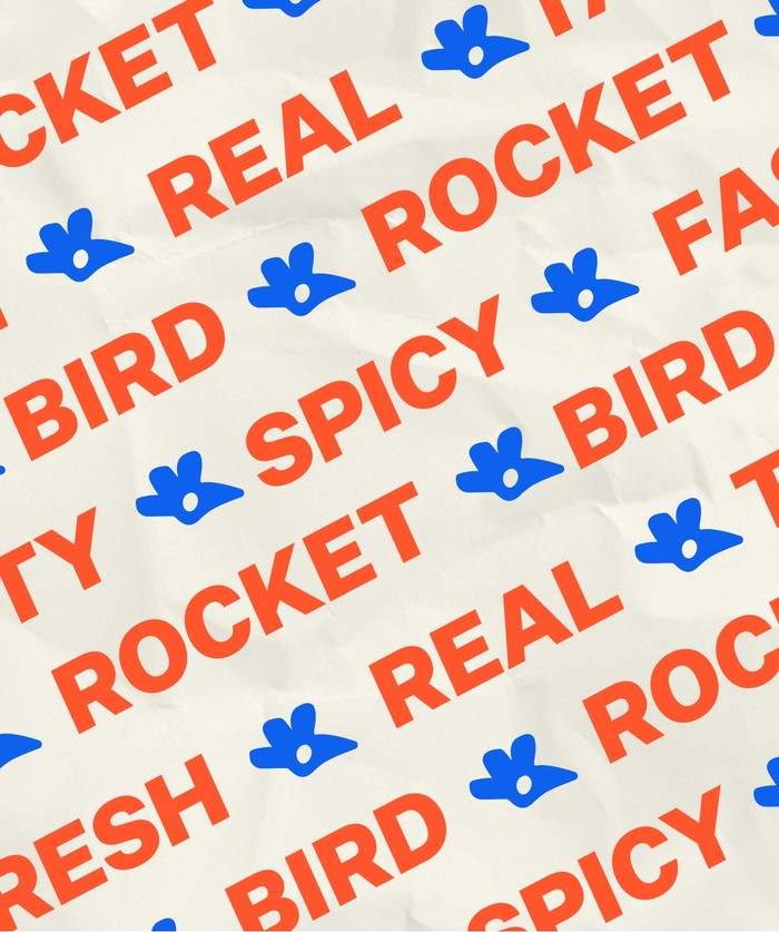 tissue paper with bold repeated type saying 'ROCKET-BIRD-FRESH-REAL-TASTY-FAST-SPICY'